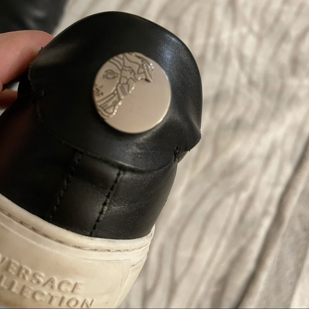 Versace slip on leather plimsolls in black size 9